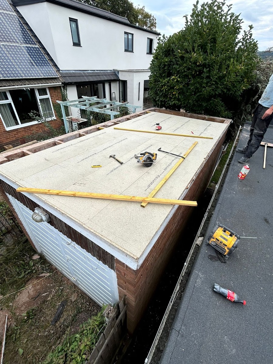 Flat roof in progress, decking laid