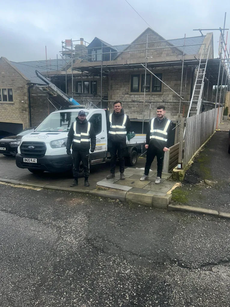 Douglas and the team in front of the branded van
